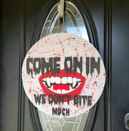 We Don't Bite Halloween Door Hanger